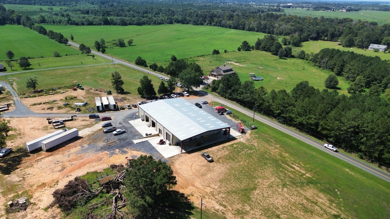 High aerial view of the store and nearby farmland