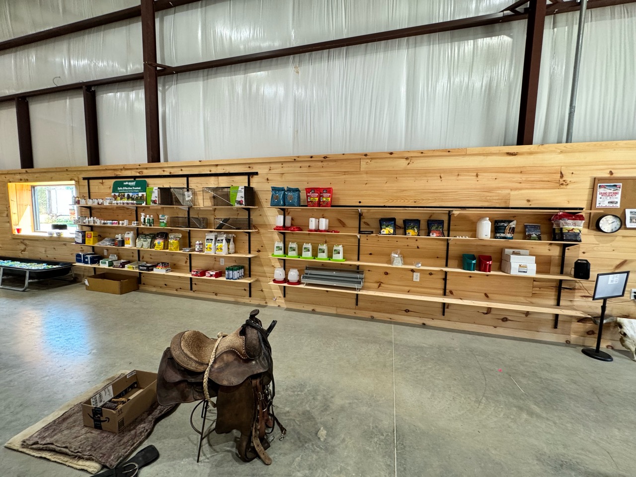 Animal-care products arranged on the store's wood shelves